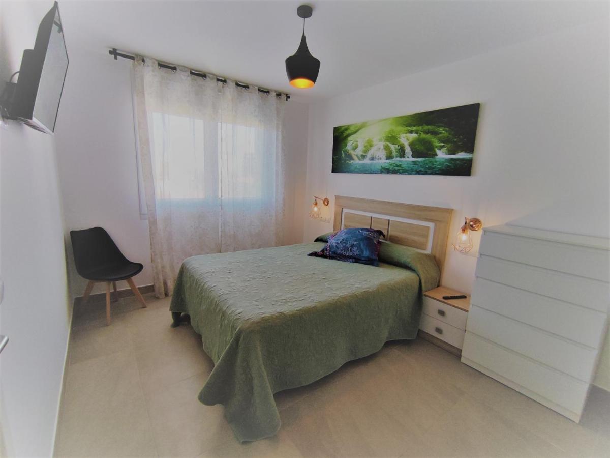 Apartamentos Playa De Covachos Сото-де-ла-Марина Экстерьер фото